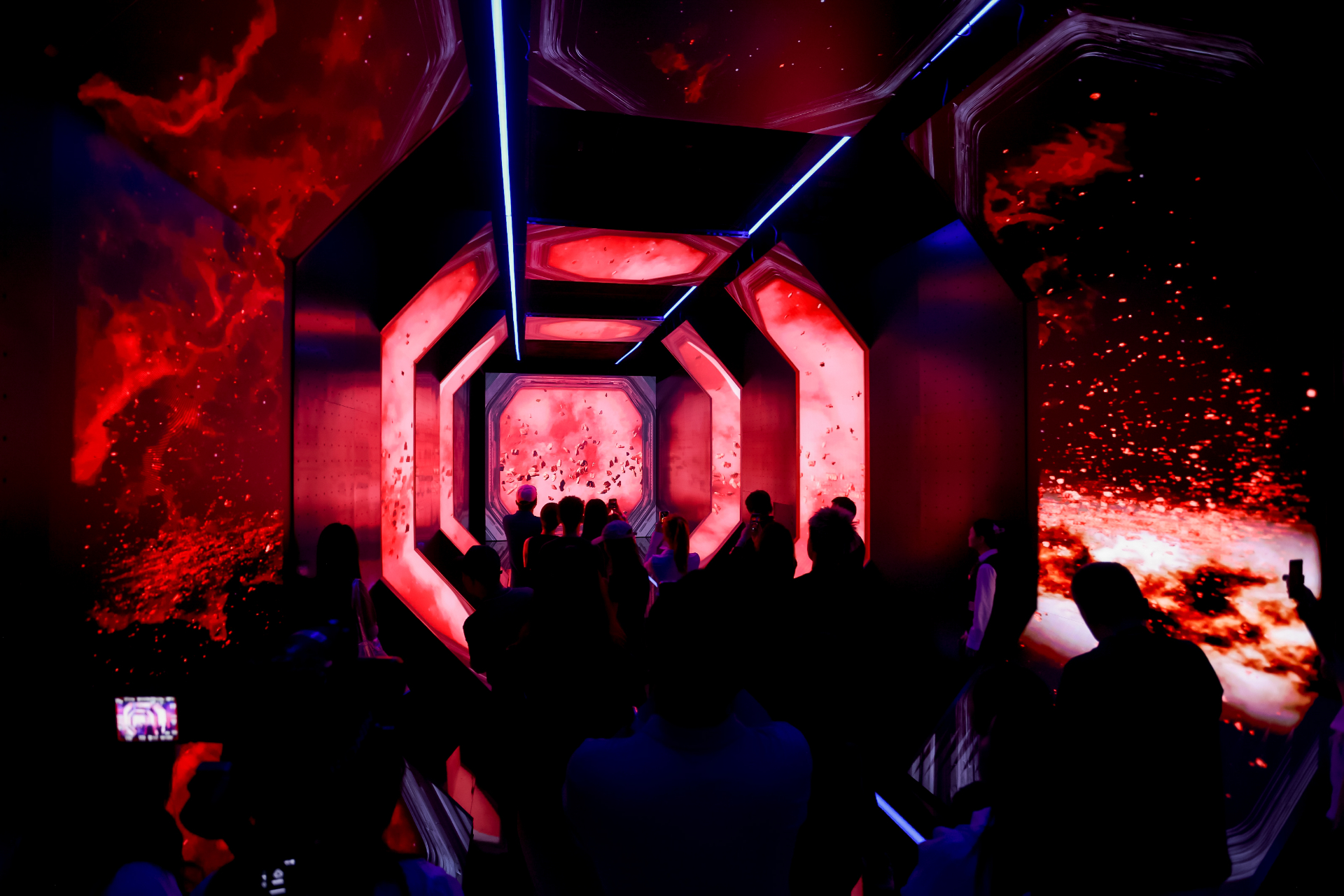 Visitors inside the red portal tunnel at Amazing Zulong